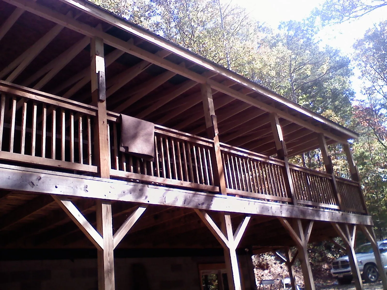 Timber framing under a new elevated porch and deck — Roof Leak Repair in Bronson by Roofing Brothers